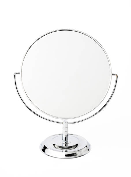 Isolated shot of silver make-up mirror on white background. Silver make-up mirror, isolated on white with two clipping path.( inside & outside ) mirror object stock pictures, royalty-free photos & images