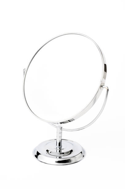 istock Isolated shot of silver make-up mirror on white background. 1141840086