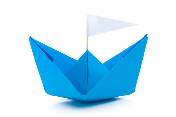 istock origami paper boat isolated on white background 1141841633