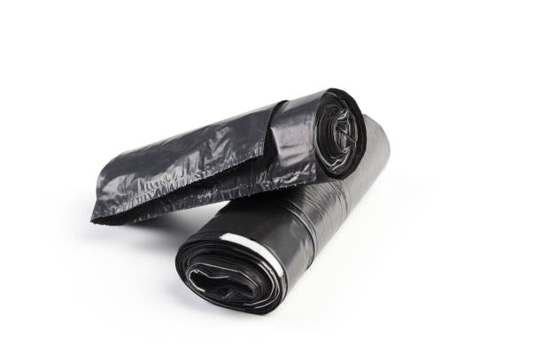 istock roll of plastic garbage bags isolated on white background 1141841744