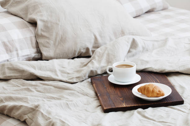 istock coffee on  tray on the bed in bedroom 1141841836