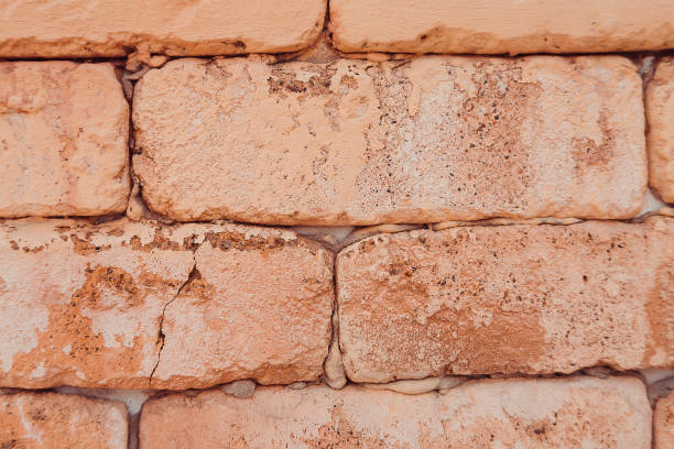istock Texture of brick yellow wall background. Close up. 1141842222