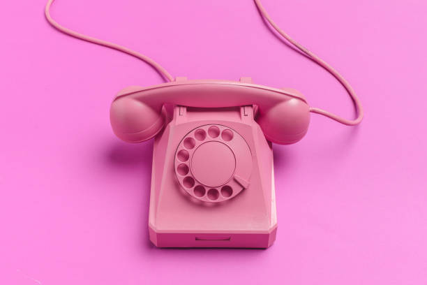 istock vintage phone on color background 1141844785