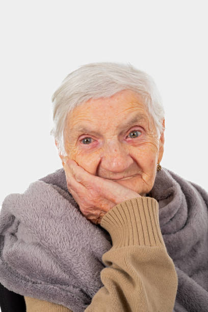 istock Old depressed lady on isolated 1141845354