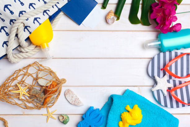 istock Beachwear and accessories on a white wooden background 1141848669