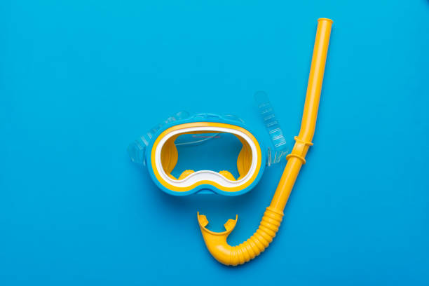 istock Snorkeling mask equipment on a vibrant background 1141850009