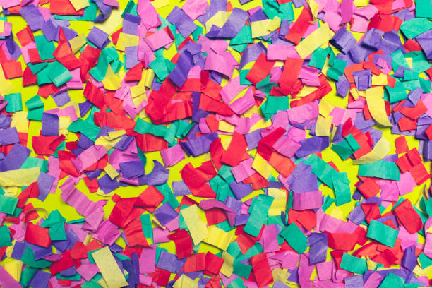 istock festive party decor and confetti on colored background 1141852156