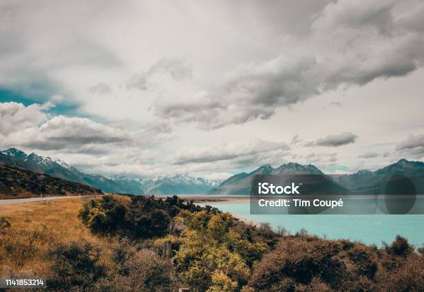 Road To Mount Cook National Park New Zealand Stock Photo - Download Image Now - Beauty, Beauty In Nature, Cloud - Sky