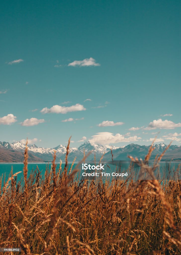 Scenic view of Mount Cook, New Zealand Down the road, shot of lake pukaki with mount Cook New Stock Photo