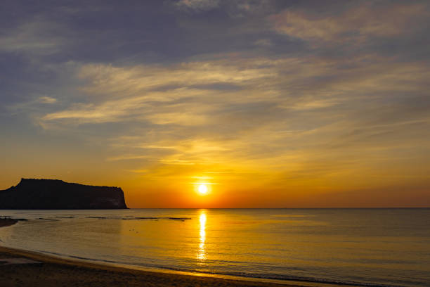 istock Colorful sunrise over the sea 1141860396
