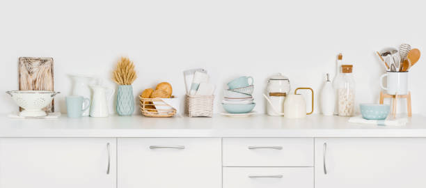 istock Kitchen counter full of various utensils isolated on white background 1141860584