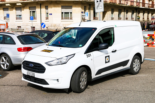 Geneva, Switzerland - March 13, 2019: Compact cargo van Ford Transit Connect in the city street.