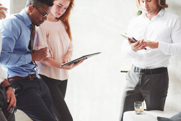 istock Looking for new ideas. Office workers having conversation during their job 1141869402