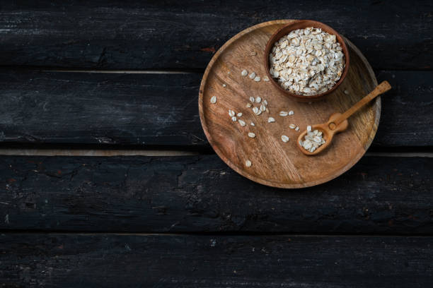 oats on a wooden bowl