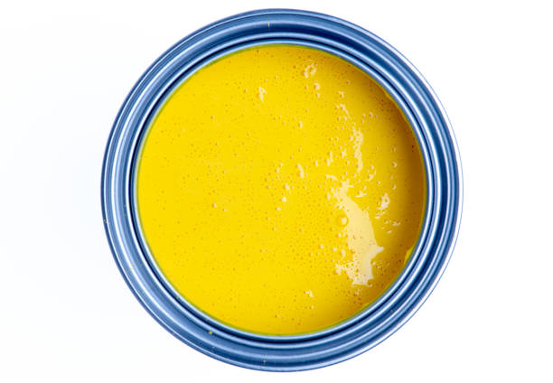 istock Can of decorative yellow paint isolated on white background 1141870036