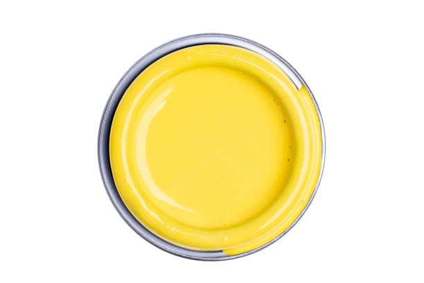 istock Can lid with yellow paint isolated on white background 1141878785