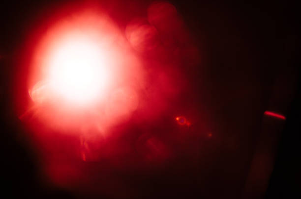 istock Abstract Natural Sun flare or Far star on the black background 1141879638