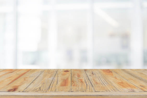 istock Empty wood table top and blurred bokeh restaurant interior background - can used for display or montage your products. 1141880113