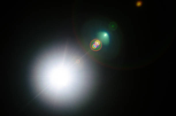 istock Abstract Natural Sun flare or Far star on the black background 1141880981