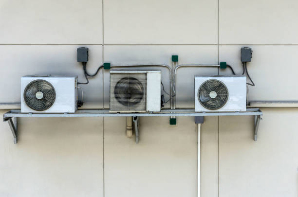 istock Air Conditioners On Building Wall 1141882283
