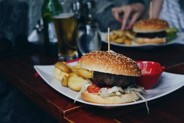 istock Close-Up Of Burger In Plate On Table 1141884761