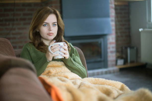 istock Young woman recovering from flu 1141886179