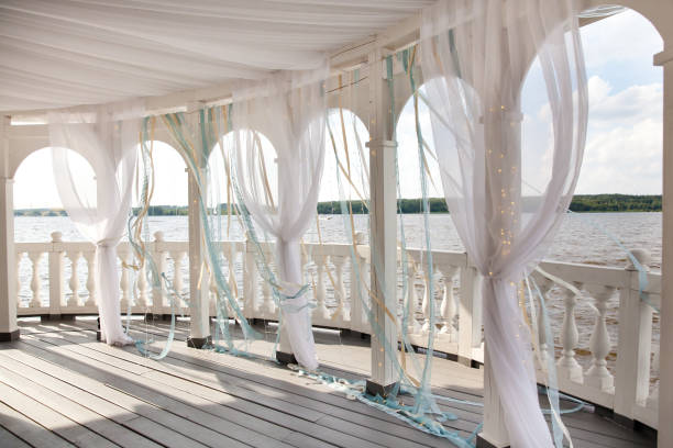 istock White veranda on the lake. 1141888467