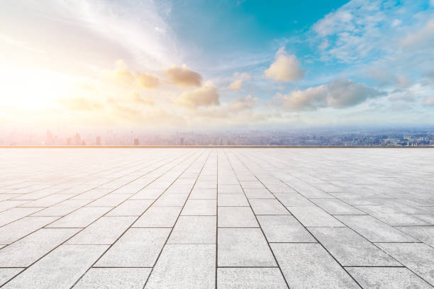 istock Shanghai city skyline and empty square floor with beautiful clouds at sunset 1141891636