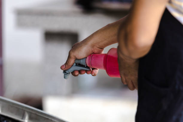 istock Midsection Of Man Holding Bottle 1141892800