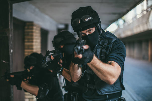 istock Armed police force in action 1141896193