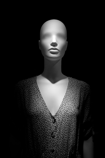 Female mannequin on black