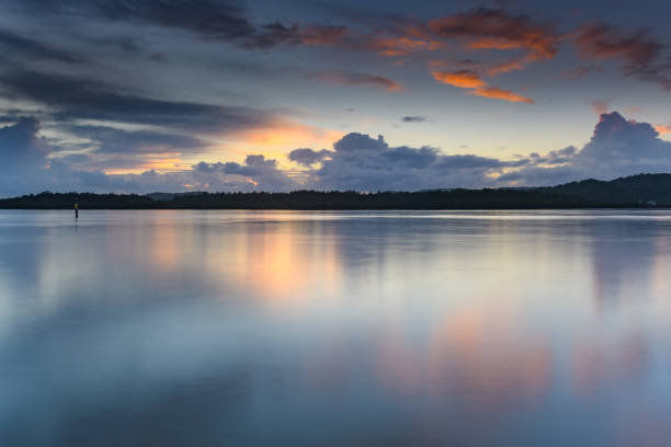 istock Early Morning Clouds and Reflections on the Bay 1141900865