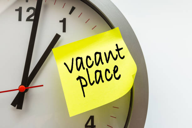 istock paper stick on clock for notice something with white background . hiring vacant - Image 1141901980