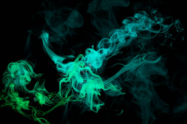 istock Green smoke graphic on black background 1141905219