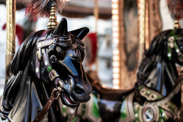 istock Bright horses carousel detail on a merry-go-round 1141906537