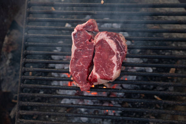 istock Beef steak on charcoal grill 1141912424