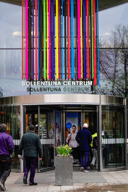 Stockholm, Sweden Stockholm, Sweden April 10, 2019  People entering the Sollentuna Centrum mall in the Sollentuna suburb north of town. sollentuna centrum stock pictures, royalty-free photos & images
