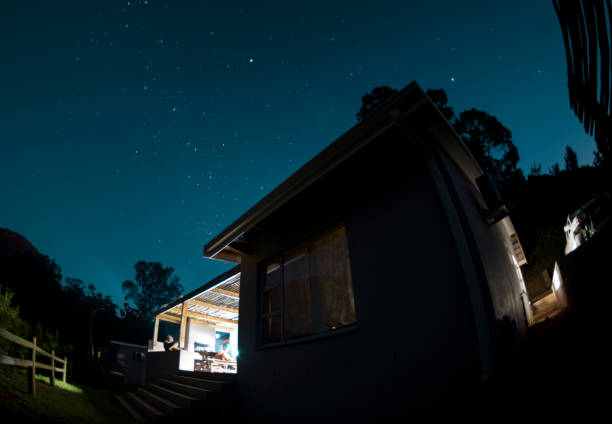 istock Mountain cabin retreat at nightime 1141920931
