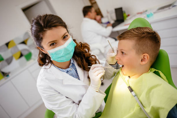 istock Little boy at dentist's office 1141931608