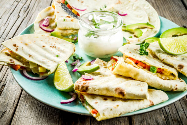 istock mexican quesadilla with white sauce 1141933010