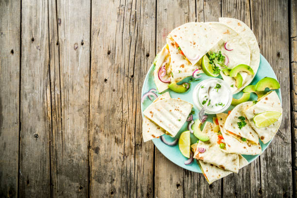 istock mexican quesadilla with white sauce 1141933031