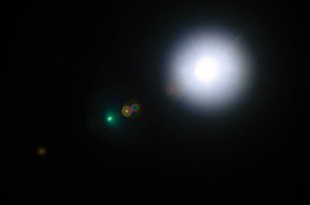 istock Abstract Natural Sun flare or Far star on the black background 1141936612