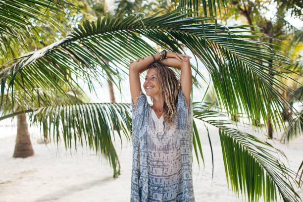istock Dreamy girl on beach 1141937190
