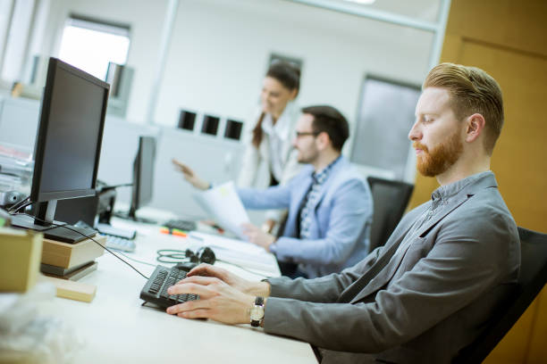 istock Young people working in the office 1141937856