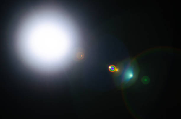 istock Abstract Natural Sun flare or Far star on the black background 1141938142