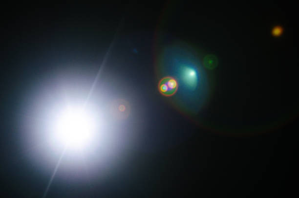 istock Abstract Natural Sun flare or Far star on the black background 1141938176
