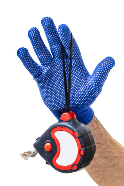 istock construction tool, tape measure in male hand 1141941317
