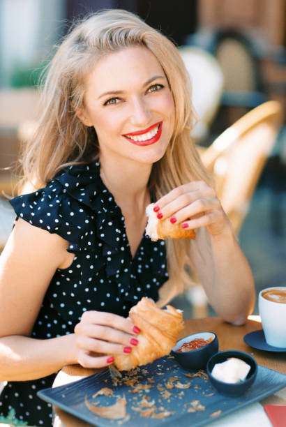 istock Beautiful woman sitting in cafe. 1141941769