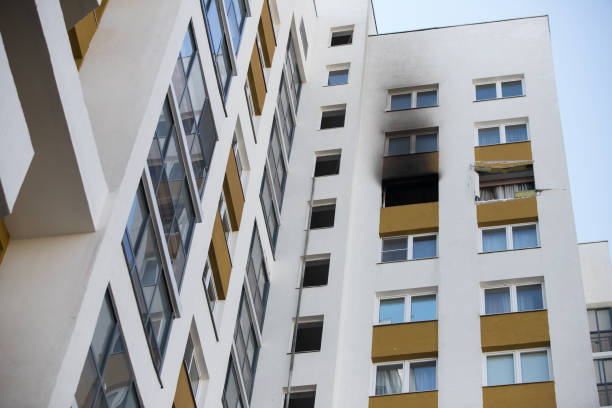 istock Front and windows of a condominium after an explosion and fire in its apartment. 1141944008