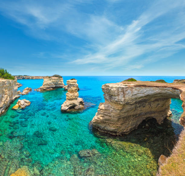 istock Faraglioni at Torre Sant Andrea, Italy 1141946048